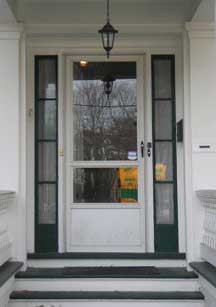 Sidelights flank the door on a Greek Revival house