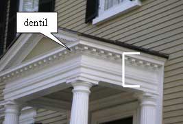 Portico entablature with dentils under the cornice on a Federal style house