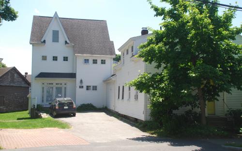 1 Summer St. rear view with converted barn 6/13/2024