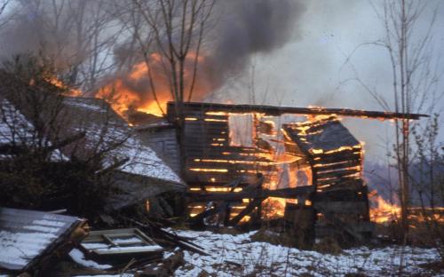 House raxed and burned. 1962
