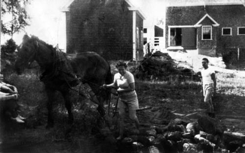 Nell & Abbott Batchelder haul rocks for house foundation 1939