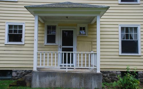 Rear porch - note milk box built-in to right of door.