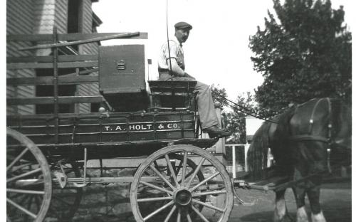Carraige house and T. A. Holt wagon