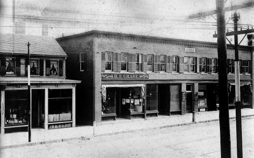 1907 Arco building, Dean's building on left. Soehrens barbershop 