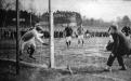 The old "Cricket Field" with soccer match. Gas tank in background 