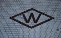 Aug. 2011 - Woolworth's logo in doorway apron.