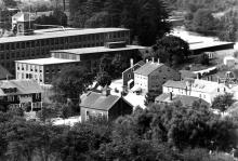 Circa 1924 Village Hall at center  